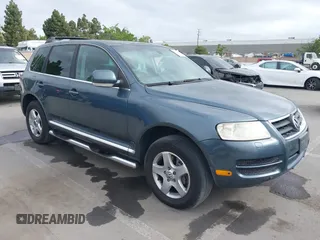 2005 Volkswagen Touareg 3.2L V6 with VIN WVGZG77L55D071024, listed as a IAAI auction lot 42111205 with 204,417 mi miles and . Bid and sale history available at DreamBid. Image 1.