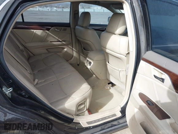 2009 Toyota Avalon XL with VIN 4T1BK36B59U325810, listed as a IAAI auction lot 41337809 with 184,476 mi miles. Bid and sale history available at carsss.com. Image 8.