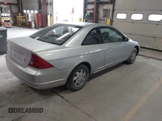 2003 Honda Civic LX with VIN 1HGEM22503L014323, listed as a IAAI auction lot 41505901 with 157,969 mi miles. Bid and sale history available at carsss.com. Image 4.