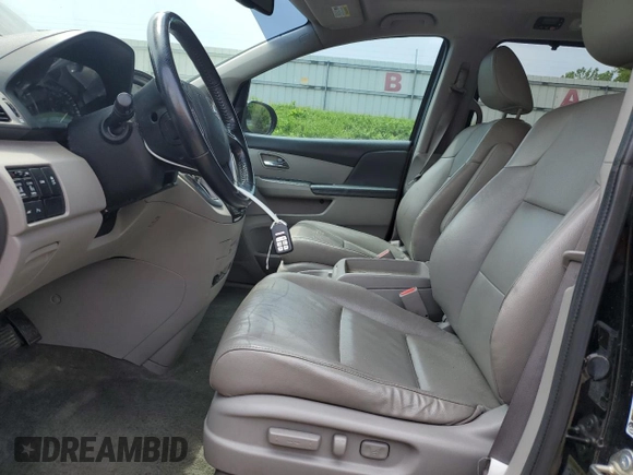 2015 Honda Odyssey Touring Elite with VIN 5FNRL5H9XFB058805, listed as a Copart auction lot 60433785 with 148,320 mi miles and Clean title. Bid and sale history available at DreamBid. Image 7.