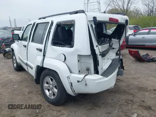 2012 Jeep Liberty Sport with VIN 1C4PJMAKXCW100451, listed as a IAAI auction lot 41987230 with 83,904 mi miles and . Bid and sale history available at DreamBid. Image 3.