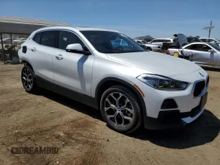 2023 BMW X2 sDrive28i z VIN WBXYH9C06P5V65784, wystawiony jako Copart lot #57108985 z przebiegiem 37 113 mil mil oraz Szkoda całkowita • Salvage title. Historia ofert i sprzedaży dostępna na DreamBid. Obrazek 4.