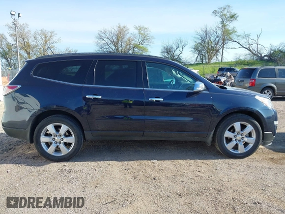 2016 Chevrolet Traverse LT z VIN 1GNKVGKD1GJ342152, wystawiony jako IAAI lot #42176937 z przebiegiem 76 739 mil mil oraz . Historia ofert i sprzedaży dostępna na DreamBid. Obrazek 13.