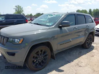 2020 Jeep Grand Cherokee Laredo E with VIN 1C4RJFAG0LC293050, listed as a IAAI auction lot 42566345 with 64,960 mi miles and . Bid and sale history available at DreamBid. Image 2.