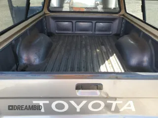 1993 Toyota Pickup z VIN 4TARN81AXPZ113969, wystawiony jako Copart lot #51845495 z przebiegiem 278 277 mil mil oraz Czysty tytuł • Clean title. Historia ofert i sprzedaży dostępna na DreamBid. Obrazek 10.