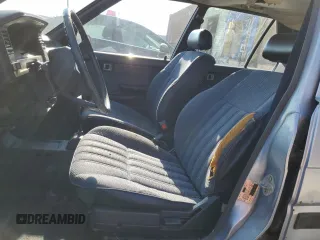 1987 Toyota Corolla с VIN JT2AE82E4H3494699, выставлен на аукционе Copart как лот 66815714 с пробегом 145 679 миль миль и Списание • Salvage title. История ставок и продаж доступна на DreamBid. Изображение 7.