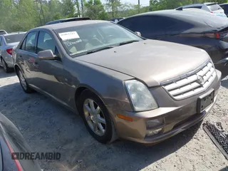 2007 Cadillac STS z VIN 1G6DW677X70117510, wystawiony jako IAAI lot #42061512 z przebiegiem 187 798 mil mil oraz . Historia ofert i sprzedaży dostępna na DreamBid. Obrazek 1.