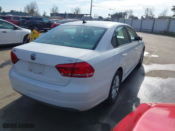 2014 Volkswagen Passat Wolfsburg Ed with VIN 1VWAT7A30EC097331, listed as a IAAI auction lot 41762061 with 173,351 mi miles. Bid and sale history available at carsss.com. Image 4.