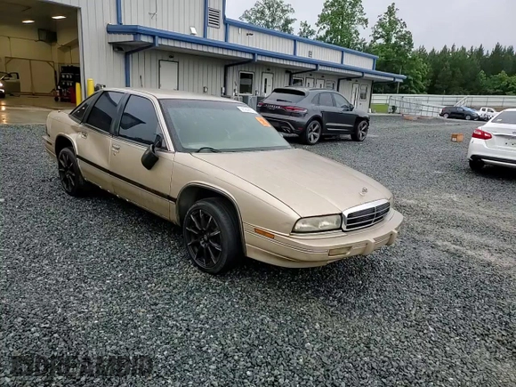 1993 Buick Regal Custom with VIN 2G4WB54L4P1411904, listed as a Copart auction lot 56564455 with 112,248 mi miles and Salvage title. Bid and sale history available at DreamBid. Image 13.
