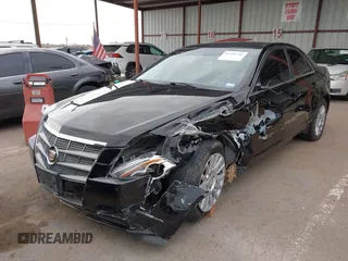 2010 Cadillac CTS with VIN 1G6DA5EGXA0138568, listed as a IAAI auction lot 41354741 with 173,253 mi miles and . Bid and sale history available at DreamBid. Image 2.