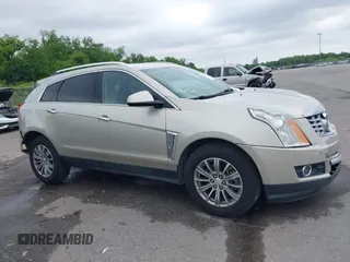 2015 Cadillac SRX Performance Collection with VIN 3GYFNCE34FS639168, listed as a IAAI auction lot 42191995 with 101,358 mi miles and . Bid and sale history available at DreamBid. Image 13.