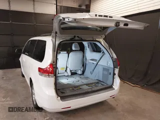 2014 Toyota Sienna LE AAS with VIN 5TDKK3DCXES499628, listed as a IAAI auction lot 42574730 with 110,532 mi miles and . Bid and sale history available at DreamBid. Image 3.