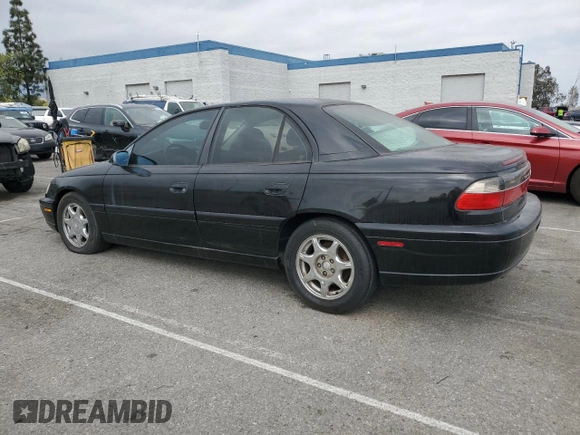 1997 Cadillac Catera z VIN W06VR52RXVR092016, wystawiony jako Copart lot #54067575 z przebiegiem 63 978 mil mil oraz Tytuł czysty. Historia ofert i sprzedaży dostępna na DreamBid. Obrazek 2.