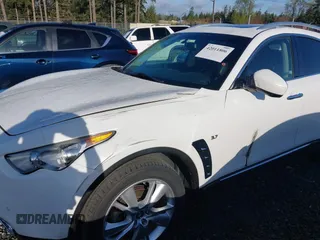 2014 Infiniti QX70 with VIN JN8CS1MW2EM411237, listed as a IAAI auction lot 42011806 with 148,133 mi miles and . Bid and sale history available at carsss.com. Image 6.