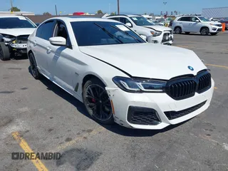 2023 BMW 5 Series 530e with VIN WBA13AG09PCM41820, listed as a IAAI auction lot 42409541 with 17,715 mi miles and . Bid and sale history available at DreamBid. Image 1.
