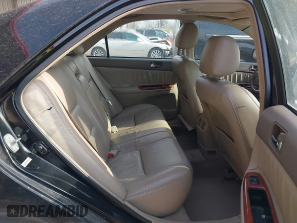 2003 Toyota Camry LE with VIN 4T1BE32K33U176270, listed as a IAAI auction lot 41995146 with 223,032 mi miles and . Bid and sale history available at DreamBid. Image 8.