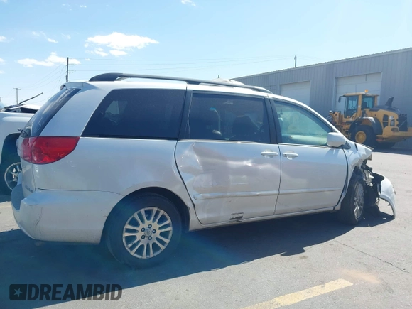 2010 Toyota Sienna XLE with VIN 5TDYK4CC3AS294129, listed as a IAAI auction lot 42510201 with 200,601 mi miles and . Bid and sale history available at DreamBid. Image 13.