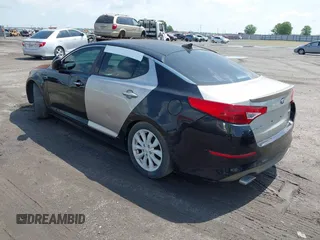 2015 Kia Optima EX z VIN 5XXGN4A79FG373483, wystawiony jako IAAI lot #42514913 z przebiegiem 246 487 mil mil oraz . Historia ofert i sprzedaży dostępna na DreamBid. Obrazek 3.