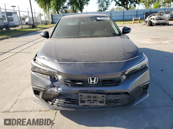 2022 Honda Civic LX z VIN 2HGFE2F26NH517811, wystawiony jako Copart lot #52933645 z przebiegiem Nie podano mil oraz Szkoda całkowita • Salvage title. Historia ofert i sprzedaży dostępna na DreamBid. Obrazek 5.