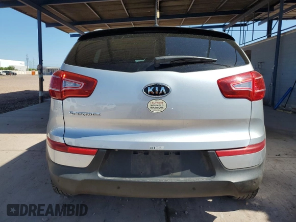 2011 Kia Sportage LX with VIN KNDPB3A2XB7087961, listed as a Copart auction lot 64266405 with 97,094 mi miles and Salvage title. Bid and sale history available at DreamBid. Image 6.