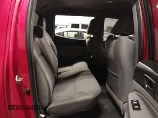 2015 Toyota Tacoma with VIN 3TMLU4EN3FM196518, listed as a IAAI auction lot 41198481 with 96,277 mi miles and . Bid and sale history available at DreamBid. Image 8.