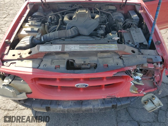1999 Ford Explorer z VIN 1FMYU22E7XUB19528, wystawiony jako Copart lot #72772864 z przebiegiem 153 581 mil mil oraz Szkoda całkowita • Salvage title. Historia ofert i sprzedaży dostępna na DreamBid. Obrazek 12.