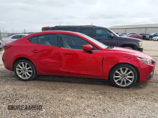 2015 Mazda 3 S Grand Touring z VIN JM1BM1W36F1250561, wystawiony jako IAAI lot #41628951 z przebiegiem 175 622 mil mil oraz . Historia ofert i sprzedaży dostępna na DreamBid. Obrazek 13.