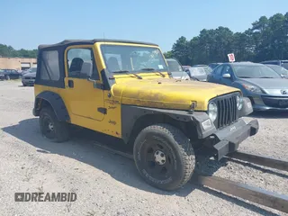 2000 Jeep Wrangler Sport with VIN 1J4FA49S4YP763414, listed as a IAAI auction lot 41478005 with 222,012 mi miles and . Bid and sale history available at DreamBid. Image 1.