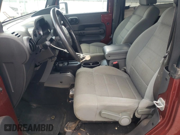 2007 Jeep Wrangler Sahara с VIN 1J4FA54137L205242, выставлен на аукционе Copart как лот 65080025 с пробегом 128 682 миль миль и Списание • Salvage title. История ставок и продаж доступна на DreamBid. Изображение 7.