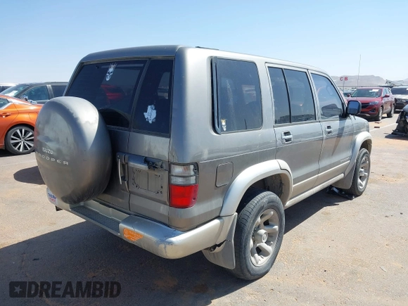 2001 Isuzu Trooper S with VIN JACDS58X717J02087, listed as a IAAI auction lot 41995938 with 206,818 mi miles and . Bid and sale history available at DreamBid. Image 4.