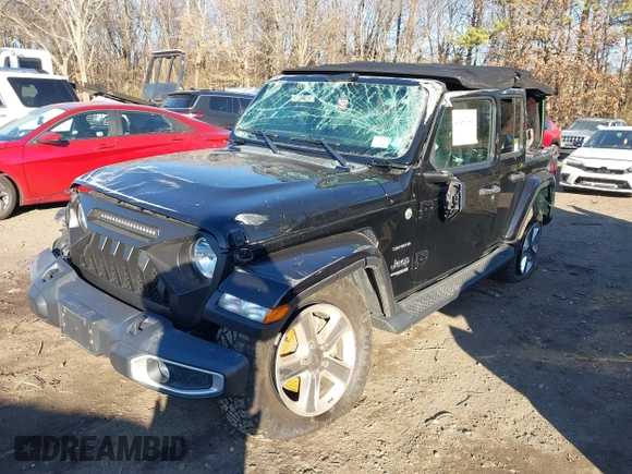 2021 Jeep Wrangler Unlimited Sahara with VIN 1C4HJXEN4MW714133, listed as a IAAI auction lot 41241040 with 82,247 mi miles and . Bid and sale history available at DreamBid. Image 2.