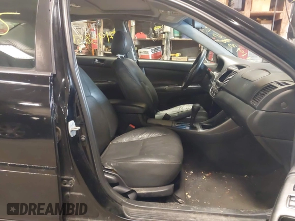 2003 Toyota Camry LE with VIN 4T1BE32K33U171859, listed as a IAAI auction lot 41938515 with 213,447 mi miles and . Bid and sale history available at DreamBid. Image 5.