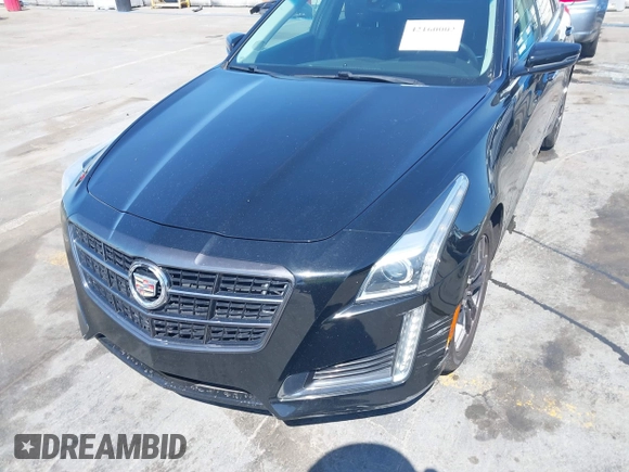 2014 Cadillac CTS RWD with VIN 1G6AP5SX0E0126103, listed as a IAAI auction lot 42160002 with 49,187 mi miles and . Bid and sale history available at DreamBid. Image 6.