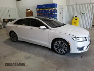 2017 Lincoln MKZ Reserve z VIN 3LN6L5E94HR644680, wystawiony jako Copart lot #52596035 z przebiegiem 124 142 mil mil oraz Szkody całkowita. Historia ofert i sprzedaży dostępna na DreamBid. Obrazek 4.