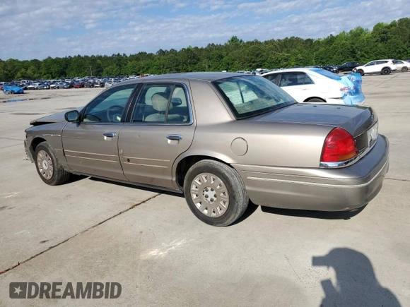 2003 Ford Police Interceptor Street Appear with VIN 2FAFP71W73X148322, listed as a Copart auction lot 55573035 with 268,812 mi miles and Salvage title. Bid and sale history available at DreamBid. Image 2.