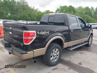 2014 Ford F-150 XL with VIN 1FTFW1ET5EKE83868, listed as a IAAI auction lot 42159157 with 173,606 mi miles. Bid and sale history available at carsss.com. Image 4.