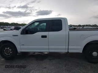 2015 Ford F-150 XL with VIN 1FTEX1CP7FFB56879, listed as a IAAI auction lot 42414408 with 212,042 mi miles and . Bid and sale history available at DreamBid. Image 14.