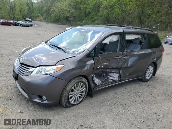 2012 Toyota Sienna XLE AAS with VIN 5TDYK3DC6CS248919, listed as a Copart auction lot 55470505 with 79,761 mi miles and Salvage title. Bid and sale history available at DreamBid. Image 1.