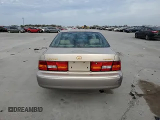 1997 Lexus ES 300 Luxury Sport Sdn with VIN JT8BF22GXV0046390, listed as a Copart auction lot 82545064 with 113,442 mi miles and Salvage Title. Bid and sale history available at carsss.com. Image 6.