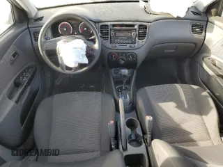 2011 Kia Rio with VIN KNADH4B32B6915325, listed as a Copart auction lot 86824074 with 167,410 mi miles and Salvage Title. Bid and sale history available at DreamBid. Image 8.