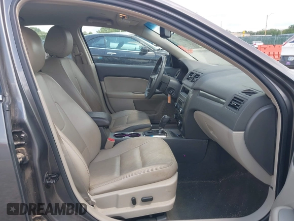 2012 Ford Fusion SEL z VIN 3FAHP0JG4CR265377, wystawiony jako IAAI lot #42221191 z przebiegiem 154 442 mil mil oraz . Historia ofert i sprzedaży dostępna na DreamBid. Obrazek 5.