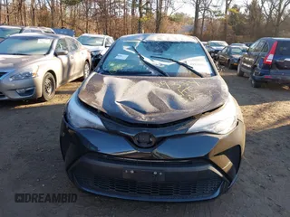 2021 Toyota C-HR LE with VIN JTNKHMBX1M1118203, listed as a IAAI auction lot 40936962 with 18,424 mi miles. Bid and sale history available at carsss.com. Image 12.