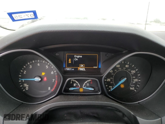 2017 Ford Focus SE z VIN 1FADP3F29HL304872, wystawiony jako Copart lot #55132865 z przebiegiem 79 831 mil mil oraz Szkoda całkowita • Salvage title. Historia ofert i sprzedaży dostępna na DreamBid. Obrazek 9.