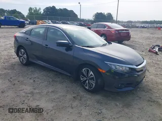 2016 Honda Civic EX-L z VIN 19XFC1F71GE015734, wystawiony jako IAAI lot #42276027 z przebiegiem 140 097 mil mil oraz . Historia ofert i sprzedaży dostępna na DreamBid. Obrazek 1.