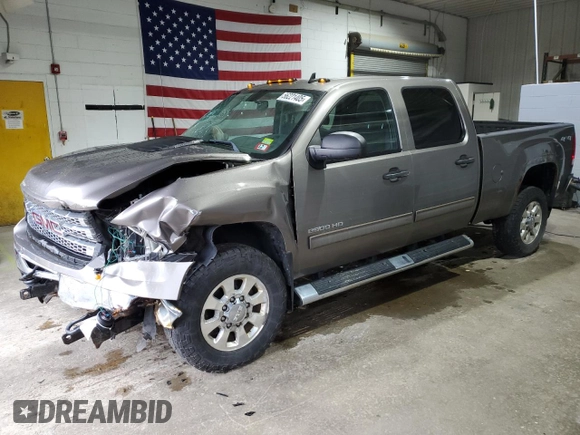 2012 GMC Sierra 2500HD SLE with VIN 1GT120CGXCF180421, listed as a Copart auction lot 56221405 with 62,006 mi miles and Salvage title. Bid and sale history available at DreamBid. Image 1.
