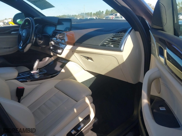 2020 BMW X4 xDrive30i with VIN 5UX2V1C07L9B83698, listed as a IAAI auction lot 41860487 with 51,891 mi miles. Bid and sale history available at carsss.com. Image 5.