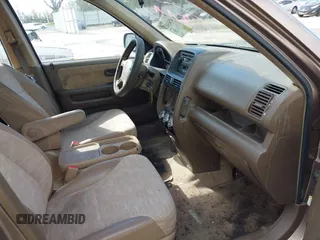 2003 Honda CR-V LX with VIN JHLRD68513C009276, listed as a IAAI auction lot 41563452 with 240,519 mi miles and . Bid and sale history available at DreamBid. Image 5.