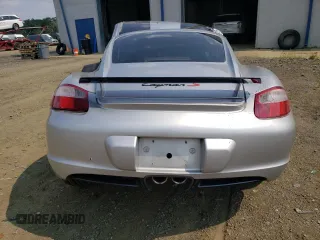 2006 Porsche Cayman S с VIN WP0AB29886U780284, выставлен на аукционе Copart как лот 65659094 с пробегом Не указан миль и Списание • Salvage title. История ставок и продаж доступна на DreamBid. Изображение 6.