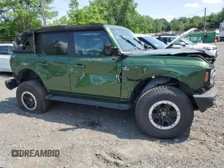 2023 Ford Bronco z VIN 1FMEE5DP7PLB60568, wystawiony jako Copart lot #62118915 z przebiegiem 25 681 mil mil oraz Nie do naprawy • Non repairable. Historia ofert i sprzedaży dostępna na DreamBid. Obrazek 4.