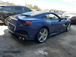2019 Ferrari Portofino z VIN ZFF89FPAXK0242549, wystawiony jako Copart lot #74454234 z przebiegiem Nie podano mil oraz Nie do naprawy. Historia ofert i sprzedaży dostępna na DreamBid. Obrazek 3.